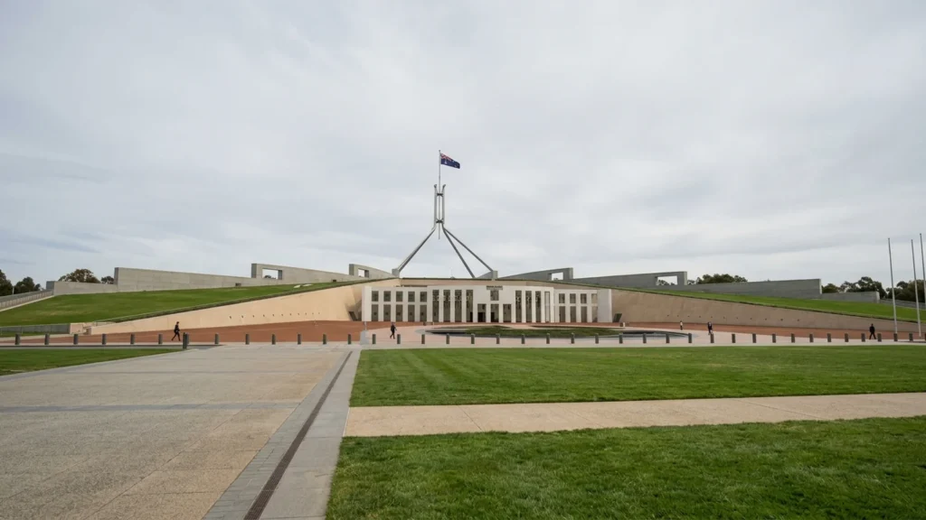 Exterior of Parliament House in Canberra, Australia, under overcast daylight